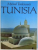 TUNISIA by MICHAEL TOMKINSON , with eighty photographs by JACQUES PEREZ , 1999 *DEFECT COTOR