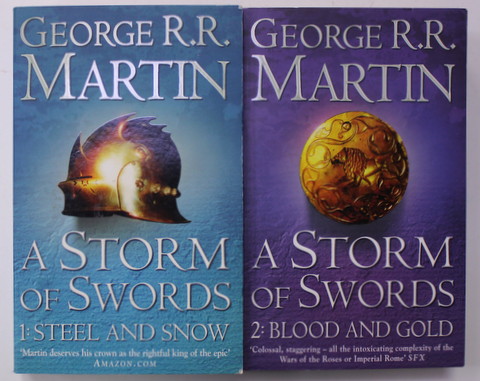 A STORM OF SWORDS by GEORGE R.R. MARTIN , VOLUMELE I - II , 2011