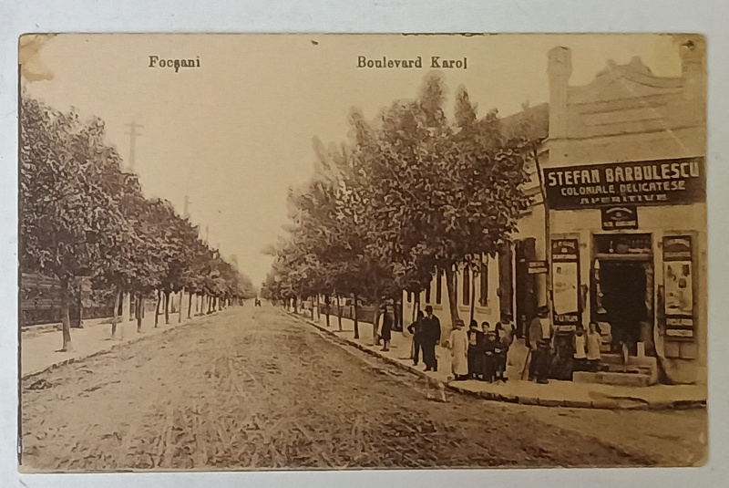 FOCSANI , BULEVARDUL UNIRII , IN PRIM PLAN MAGAZINUL ' STEFAN BARBULESCU - COLONIALE , DELICATESE , APERITIVE ' , CARTE POSTALA , 1918