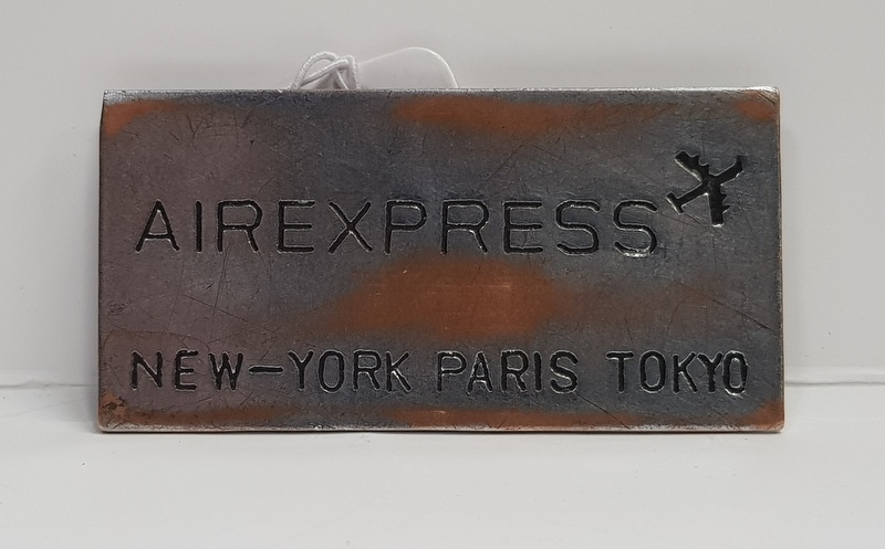 PLACUTA METALICA ' AIREXPRESS - NEW - YORK - PARIS - TOKIO ' , ANII '70