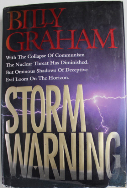 STORM WARNING by BILLY GRAHAM , 1992 , COPERTA CARTONATA , SUPRACOPERTA DEFECTA , PREZINTA HALOURI DE APA