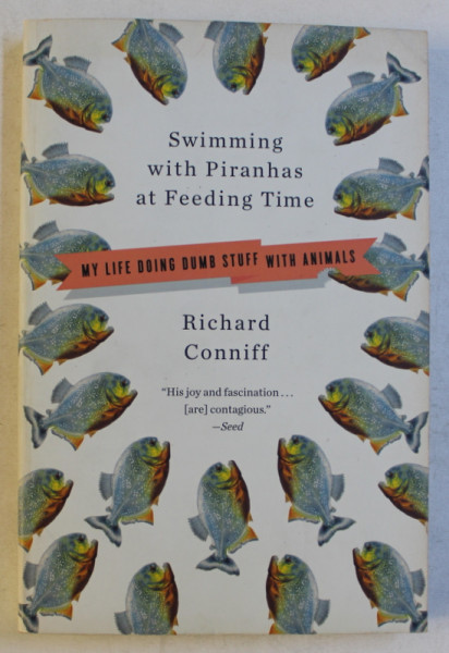 SWIMMING WITH PIRANHAS AT FEEDING TIME by RICHARD CONNIFF , 2009